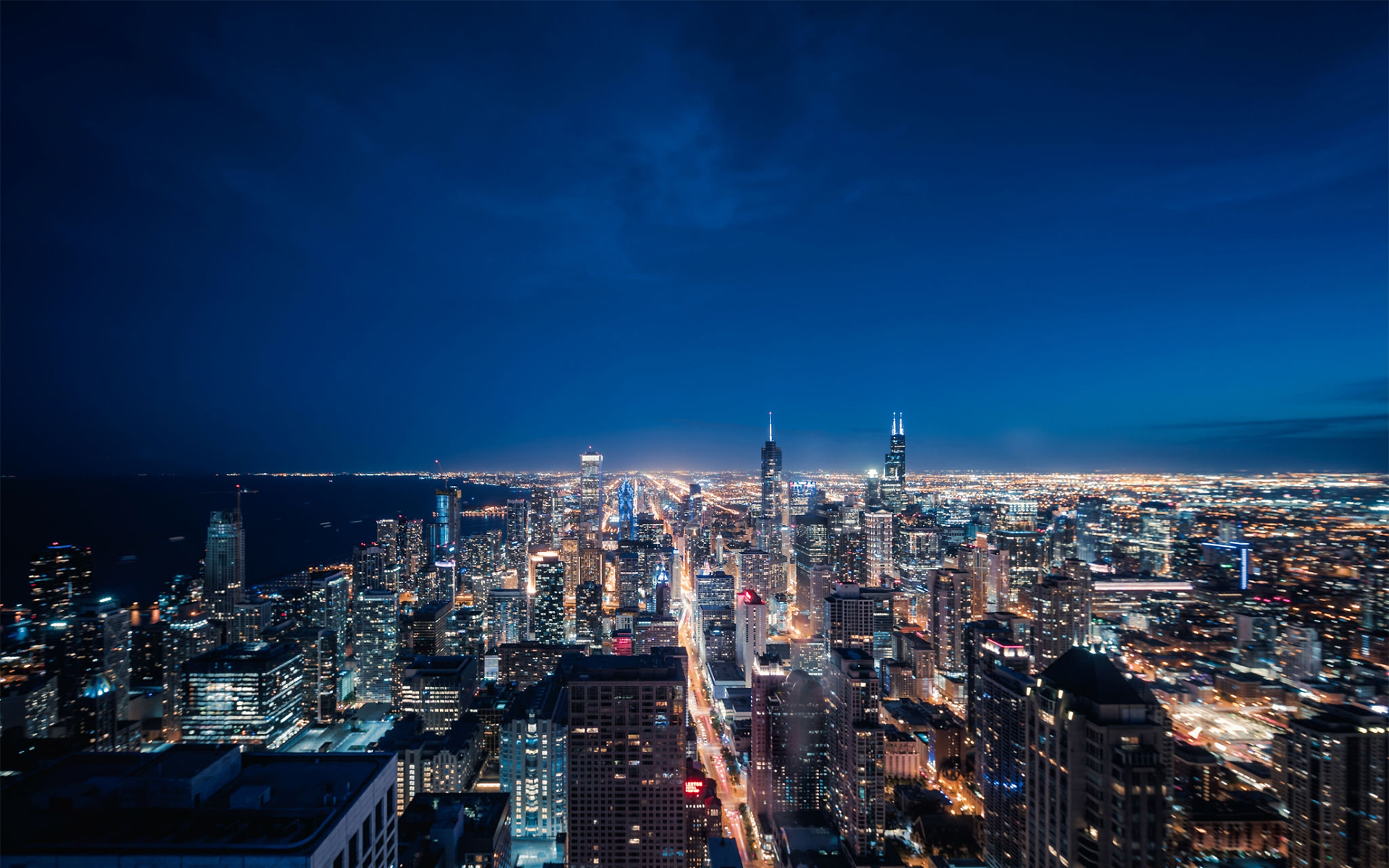 https://expats.istanbul/wp-content/uploads/2021/01/1160442138-Aerial-View-of-Chicago-cityscape-skyline-at-Night-1.jpg